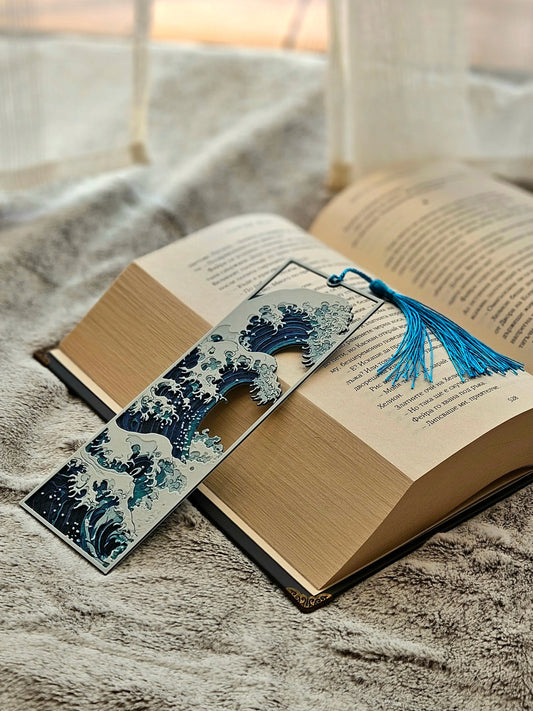 Decorative bookmark with wave design on an open book
